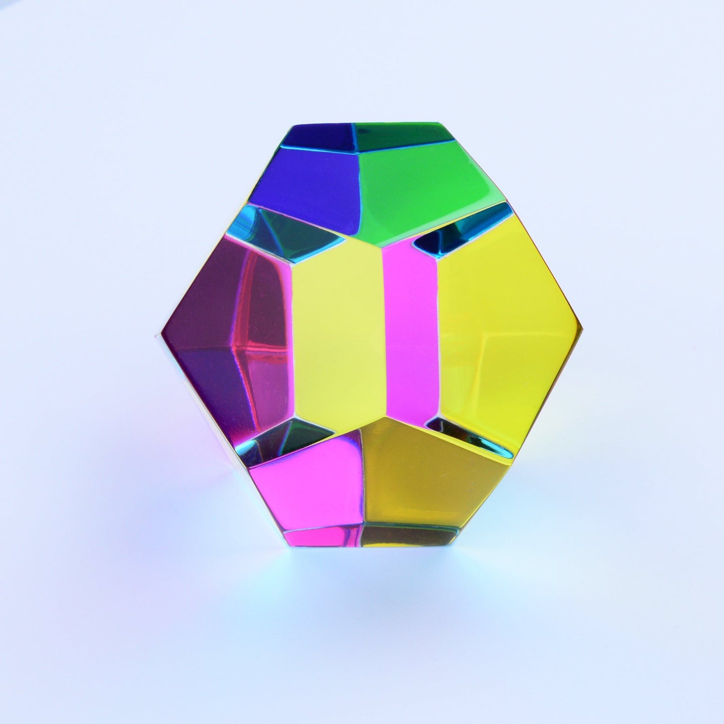 The Poly Pack of CMY polyhedrons on a plain background
