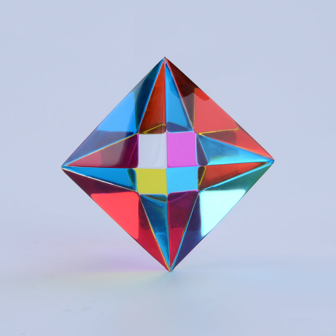 The Aether, a translucent CMY octahedron, in low light where its colours begin to fade to grey