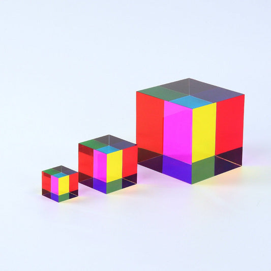 A translucent CMY Cube showing orange where its magenta and yellow faces overlap